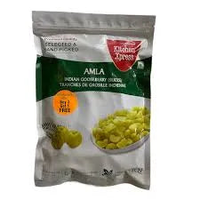 Package of Kitchen Trend Amla powder with green amla berries on a white background