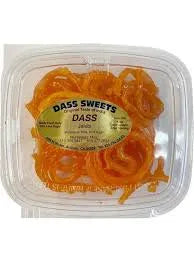 Packaged orange candy labeled 'Dass Sweets' on a white background
