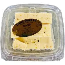 Packaged cheese with a label on a clear background
