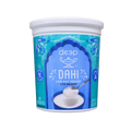 Container of deep Dahi low-fat yogurt on a white background