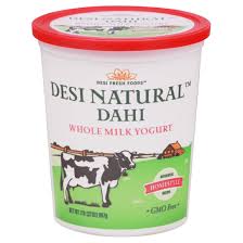 Desi Natural Dahi yogurt container with cow illustration on a white background