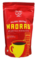 Red coffee package with 'Madras' branding on a white background