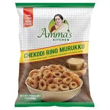 Packaged food item with 'Amma's Kitchen' branding and a bowl of chekodi ring murukku.