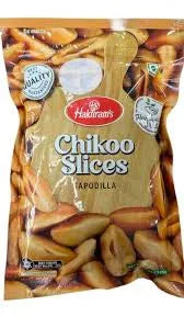 Packaged Chikoo Slices with Makhan's branding on a white background