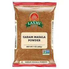 Pack of Laxmi Garam Masala Powder with a red and white label.